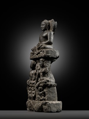 Lot 334 - A BLACK STONE STELE DEPICTING AN ENTHRONED MAHAVIRA ATTENDED BY A YAKSHA AND YAKSHI, PALA PERIOD, 11TH-12TH CENTURY