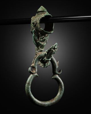 Lot 412 - A BRONZE PALANQUIN HOOK AND RING, ANGKOR PERIOD