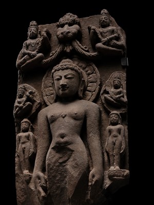 Lot 332 - A SUPERB STONE STELE DEPICTING A TIRTHANKARA, KARNATAKA, 12TH CENTURY