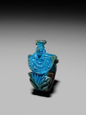 Lot 46 - A RARE TURQUOISE GLAZED FAIENCE RING WITH AEGIS OF NEPHTHYS, THIRD INTERMEDIATE PERIOD, DYNASTY XXII