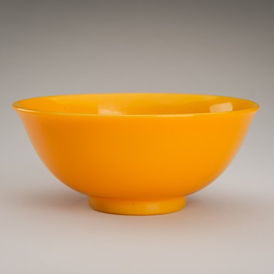 Lot 760 - A PEKING YELLOW GLASS BOWL, QIANLONG MARK