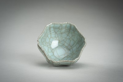 Lot 913 - A HEXAGONAL SONG-STYLE CELADON CUP, QING DYNASTY