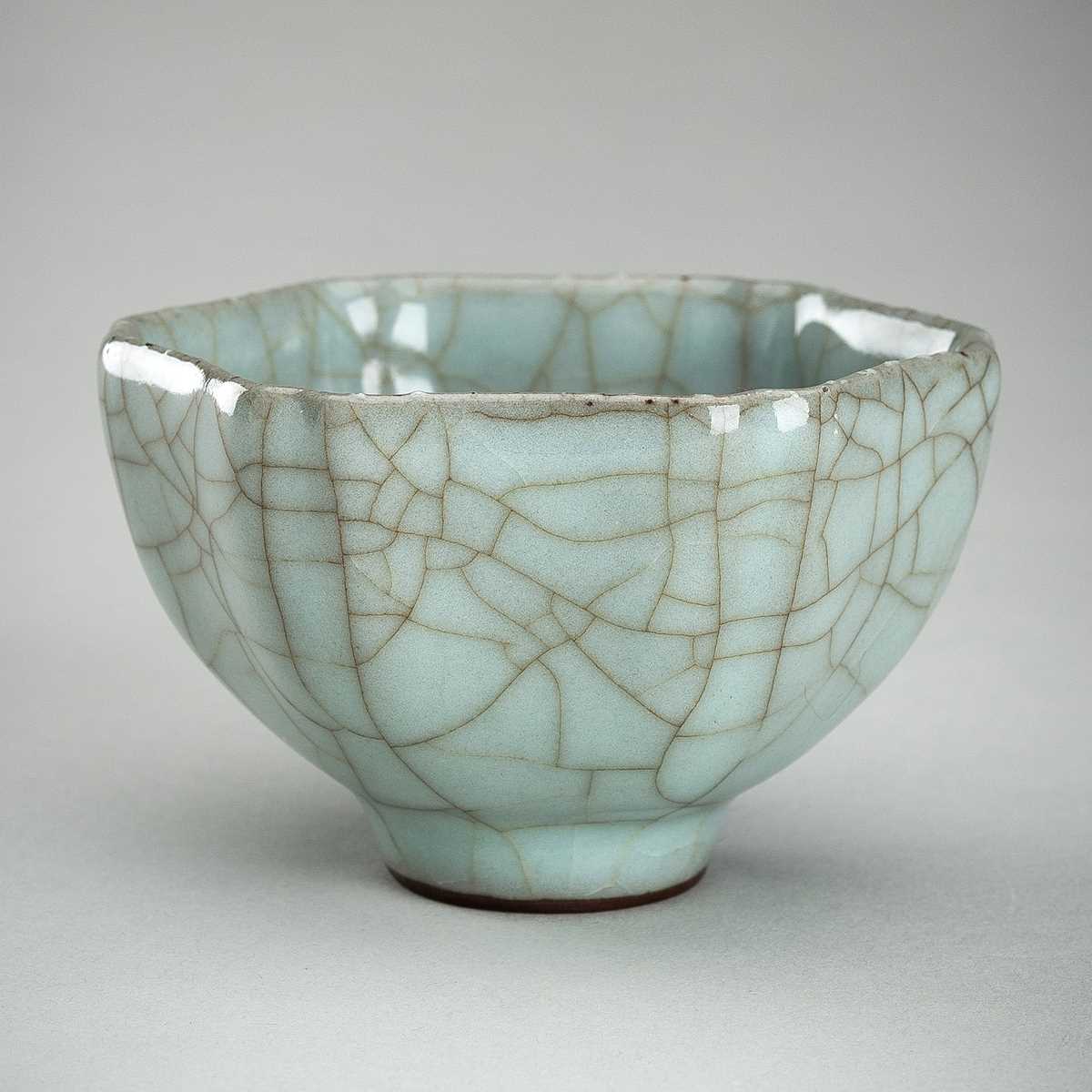 Lot 913 - A HEXAGONAL SONG-STYLE CELADON CUP, QING DYNASTY