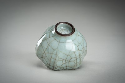 Lot 913 - A HEXAGONAL SONG-STYLE CELADON CUP, QING DYNASTY
