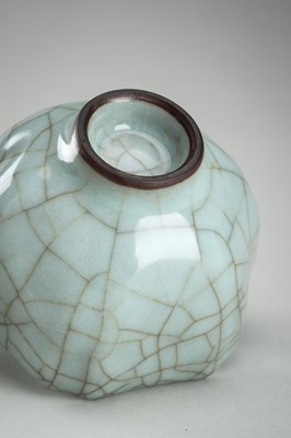 Lot 913 - A HEXAGONAL SONG-STYLE CELADON CUP, QING DYNASTY