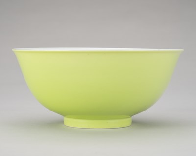 Lot 925 - A PALE LIME GREEN GLAZED PORCELAIN BOWL, GUANGXU MARK AND PERIOD