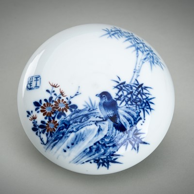 Lot 976 - A BLUE AND WHITE PORCELAIN BOX AND COVER WITH A BIRD, AFTER WANG BU