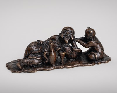 Lot 701 - A BRONZE 'SCHOLAR AND BOY' PAPERWEIGHT, 17th/18th CENTURY