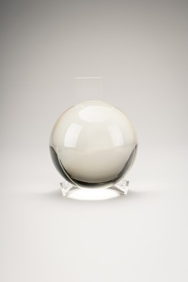 AN OKIMONO OF A ROCK CRYSTAL SPHERE ON A FINE BRONZE WAVE-FORM STAND