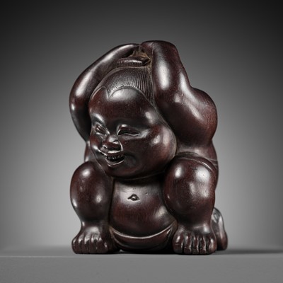 Lot 133 - MINKO: A SUPERB AND LARGE WOOD NETSUKE OF OKAME FIXING HER HAIR