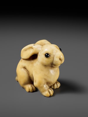Lot 83 - YOSHIMASA: A SUBERB KYOTO SCHOOL MARINE IVORY NETSUKE OF A RABBIT