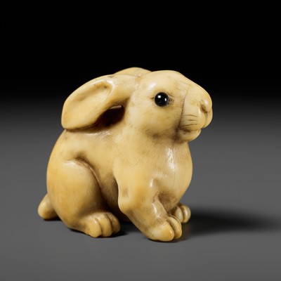 Lot 83 - YOSHIMASA: A SUBERB KYOTO SCHOOL MARINE IVORY NETSUKE OF A RABBIT