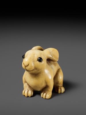 Lot 83 - YOSHIMASA: A SUBERB KYOTO SCHOOL MARINE IVORY NETSUKE OF A RABBIT