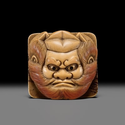 Lot 331 - KOKUSAI AND JUGYOKU: A RARE HONEN (HORNBILL) AND ANTLER MASK KANAMONO (POUCH CLASP) DEPICTING SHOKI