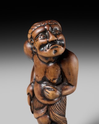 Lot 197 - A SUPERB AND LARGE EDO SCHOOL WOOD NETSUKE OF A DANCING MONEY LENDER