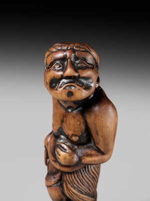 Lot 197 - A SUPERB AND LARGE EDO SCHOOL WOOD NETSUKE OF A DANCING MONEY LENDER