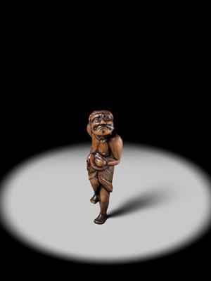 Lot 197 - A SUPERB AND LARGE EDO SCHOOL WOOD NETSUKE OF A DANCING MONEY LENDER