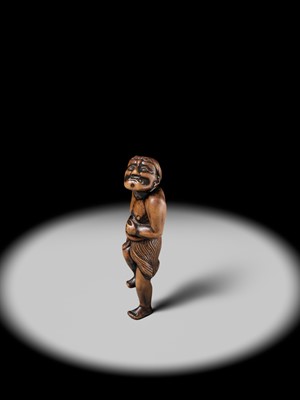 Lot 197 - A SUPERB AND LARGE EDO SCHOOL WOOD NETSUKE OF A DANCING MONEY LENDER