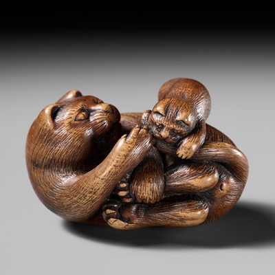 Lot 370 - MASATOSHI: A FINE STAINED WOOD NETSUKE OF A CAT WITH YOUNG