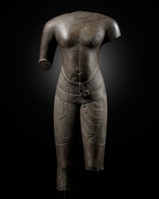 Lot 403 - A POLISHED SANDSTONE TORSO OF A MALE DEITY, ANGKOR PERIOD, BAPHUON STYLE