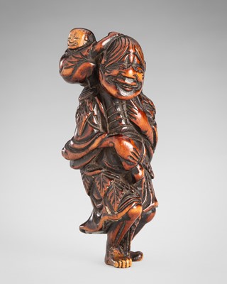 Lot 325 - A FINE WOOD NETSUKE OF A SENNIN CARRYING A BOY