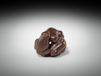 Lot 381 - SENKO: A WOOD NETSUKE OF FROGS AND LOTUS