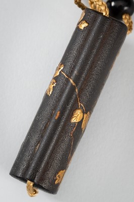 Lot 1414 - A SIDE-OPENING LACQUER INRO WITH A GRASSHOPPER ON LEAFY VINES