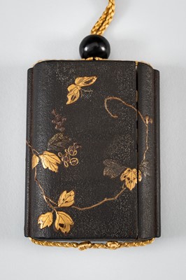 Lot 1414 - A SIDE-OPENING LACQUER INRO WITH A GRASSHOPPER ON LEAFY VINES
