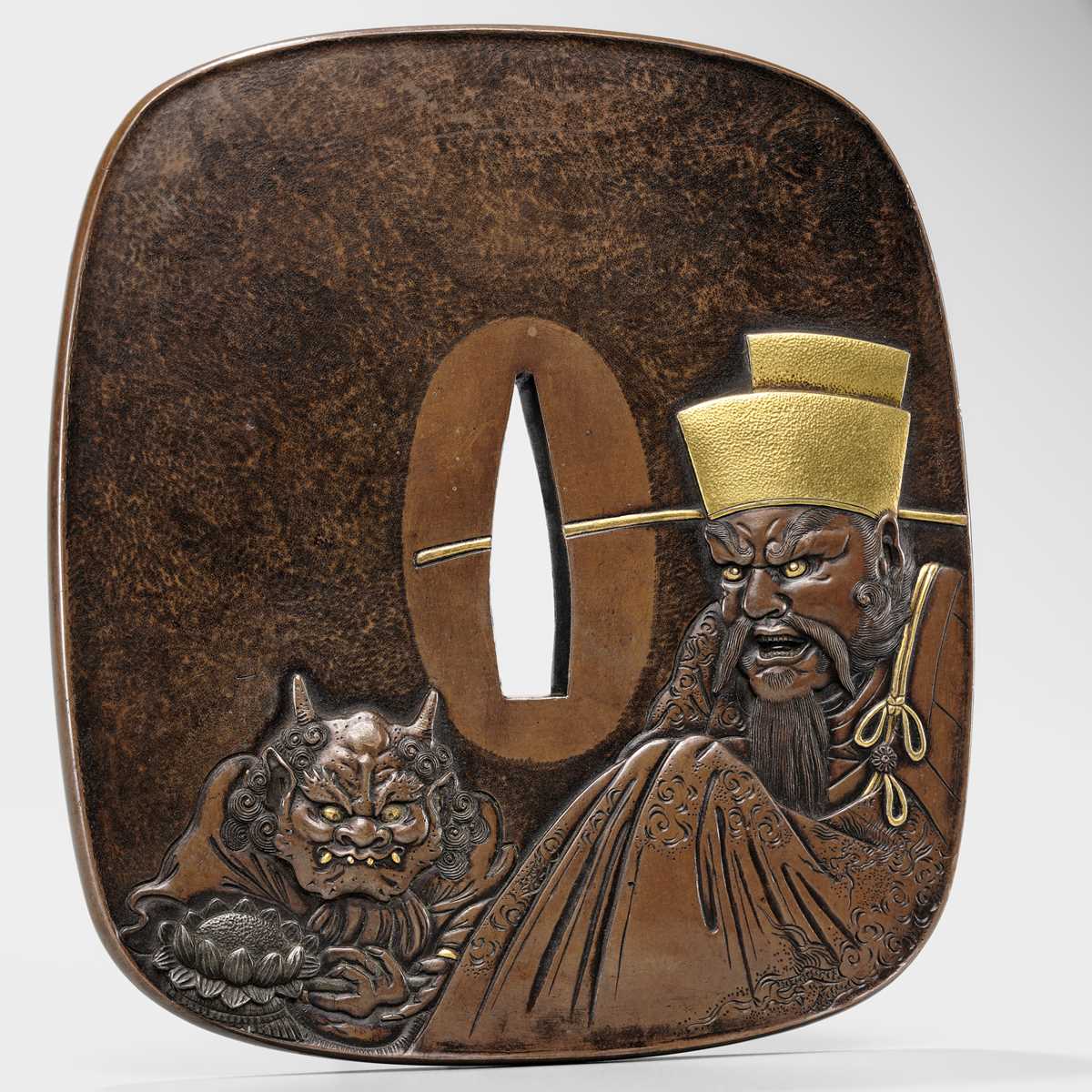A SUPERB AND LARGE HAMANO SCHOOL SUAKA TSUBA WITH EMMA-O AND ONI