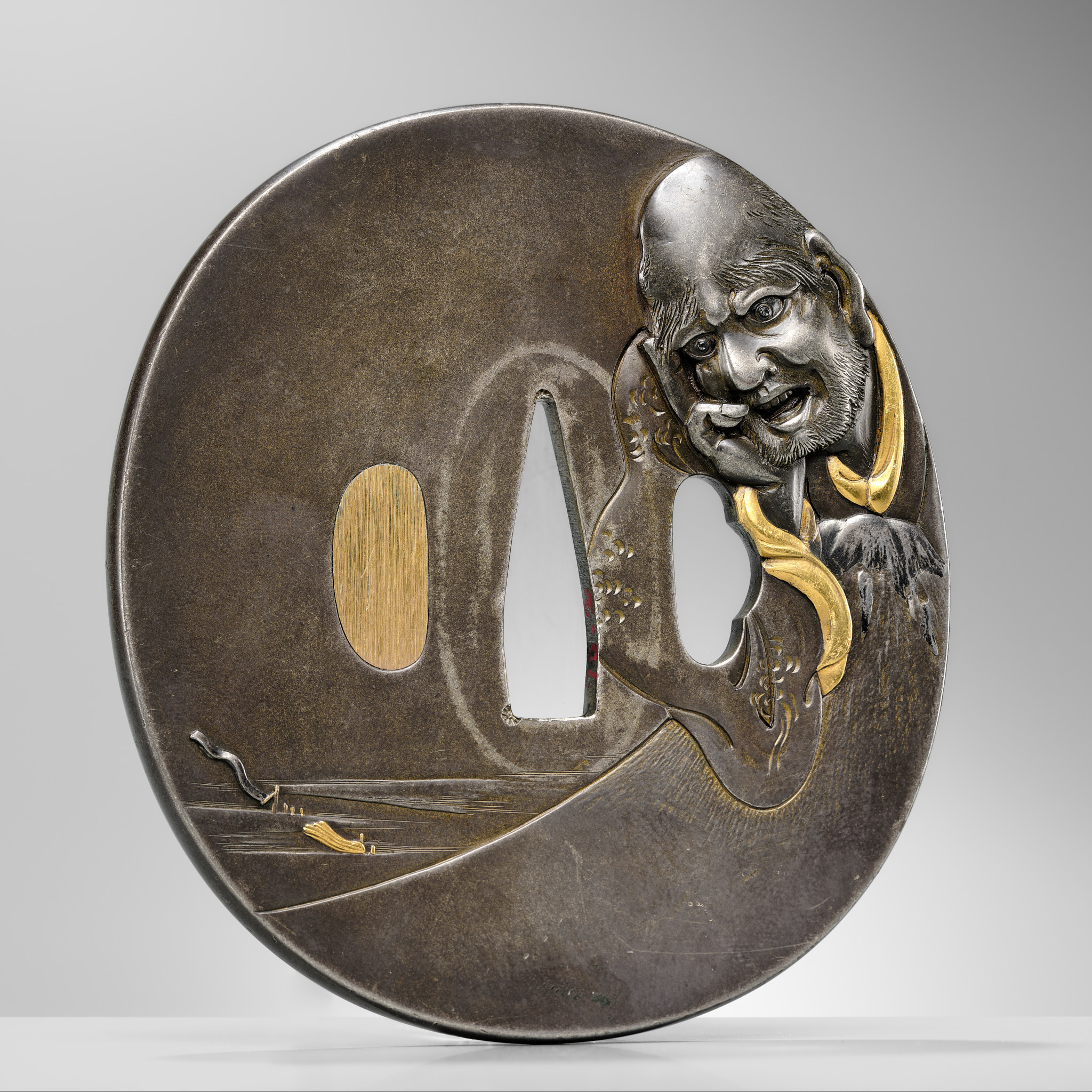 Lot 98 - NOBUYOSHI: A FINE SHIBUICHI TSUBA WITH