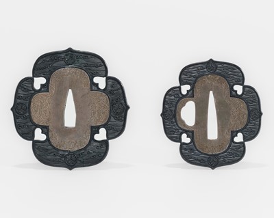 Lot 610 - A SHAKUDO AND SILVER DAISHO TSUBA SET WITH KIRI AND AOI MON