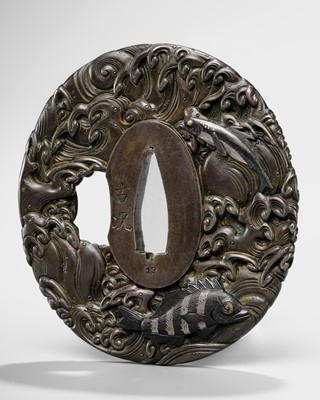 Lot 89 - KOKYO: A FINE SHIBUICHI TSUBA WITH FLYING FISH (TOBIUO) AMONG TURBULENT WAVES