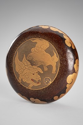 Lot 126 - A LACQUER KOGO (INCENSE BOX) WITH A SHISHI
