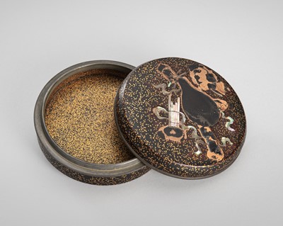 Lot 129 - AN INLAID LACQUER KOGO (INCENSE BOX) WITH MUSIC INSTRUMENTS