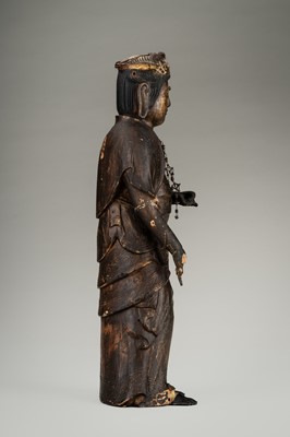 Lot 67 - AN OLD GILT AND LACQUERED WOOD FIGURE OF KANNON