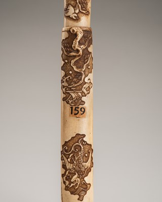 Lot 1182 - A FINE ANTLER KISERUZUTSU DEPICTING A WINGED CREATURE