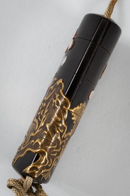 Lot 1428 - A LARGE INLAID FOUR-CASE LACQUER INRO DEPICTING BLOOMING FLOWERS