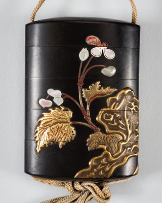 Lot 1428 - A LARGE INLAID FOUR-CASE LACQUER INRO DEPICTING BLOOMING FLOWERS
