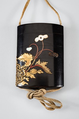 Lot 1428 - A LARGE INLAID FOUR-CASE LACQUER INRO DEPICTING BLOOMING FLOWERS