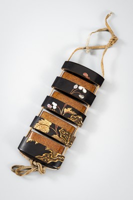 Lot 1428 - A LARGE INLAID FOUR-CASE LACQUER INRO DEPICTING BLOOMING FLOWERS