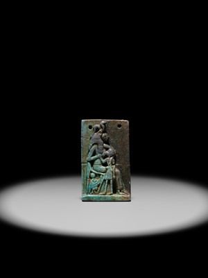 A TURQUOISE-GLAZED FAIENCE AMULET OF SEKHMET NURSING THE YOUNG PHARAOH, LATE PERIOD TO PTOLEMAIC ERA