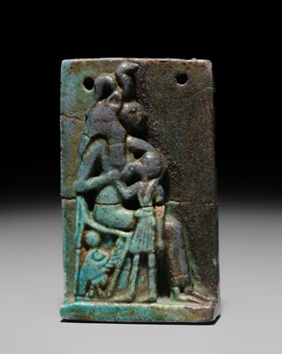 A TURQUOISE-GLAZED FAIENCE AMULET OF SEKHMET NURSING THE YOUNG PHARAOH, LATE PERIOD TO PTOLEMAIC ERA