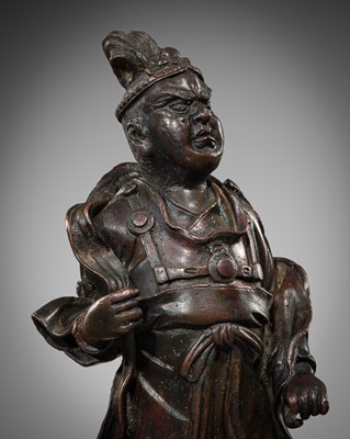 Lot 350 - A BRONZE FIGURE OF A GUARDIAN, QING DYNASTY