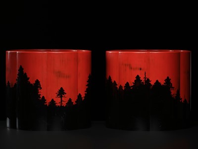 Lot 341 - AN IMPRESSIVE PAIR OF NEGORO-STYLE 'SUNSET FOREST' LACQUER HIBACHI (BRAZIERS)