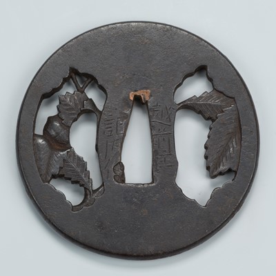 Lot 1500 - KINAI: A KINAI SCHOOL IRON SUKASHI TSUBA WITH ACORNS