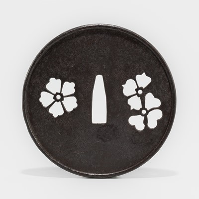 Lot 607 - A LARGE IRON KATCHUSHI TSUBA WITH CHERRY BLOSSOMS