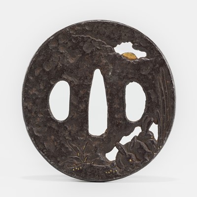 Lot 1486 - AN IRON SUKASHI TSUBA WITH A PAIR OF RABBITS UNDER THE MOON