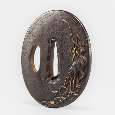 Lot 617 - A FINE IRON TSUBA WITH A PAIR OF CRANES