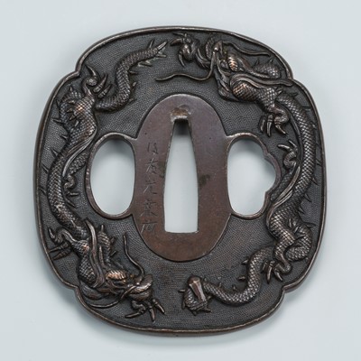 Lot 1524 - GOTO KOJO: A GOTO SCHOOL PATINATED COPPER TSUBA WITH DRAGONS