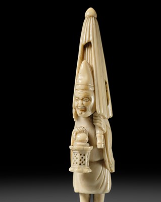 Lot 431 - A TALL OSAKA SCHOOL IVORY NETSUKE OF THE OIL THIEF ABURA BOZU